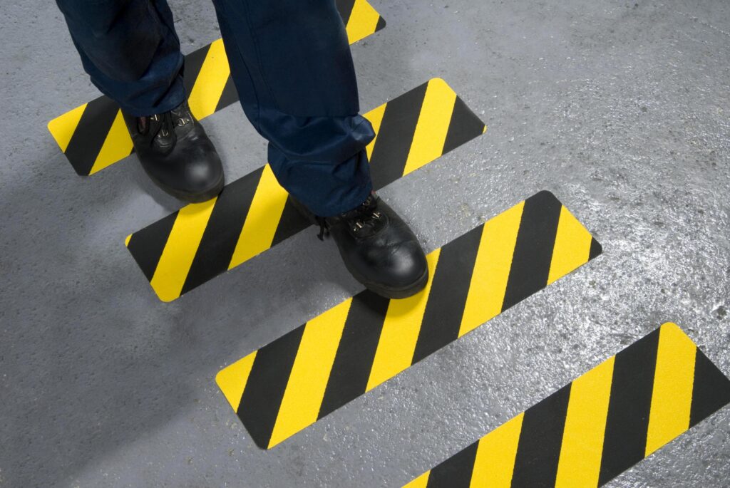 Veiligheidsgrip met gevarensignalering op hoek
